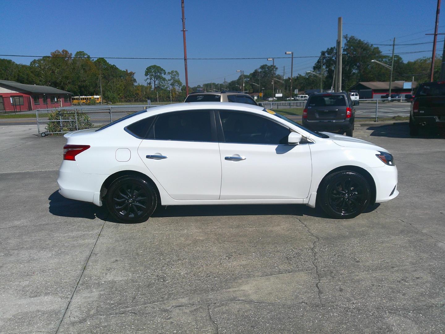 2018 WHITE NISSAN SENTRA SR; S; SL; SV (3N1AB7AP5JY) , located at 1200 Cassat Avenue, Jacksonville, FL, 32205, (904) 695-1885, 30.302404, -81.731033 - Photo#4